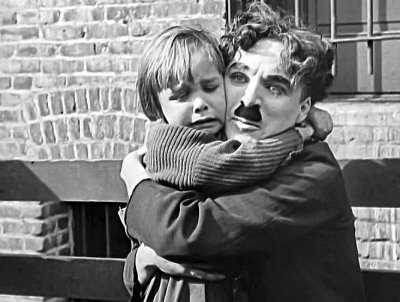 1921 - Charlie Chaplin and Jackie Coogan in The Kid