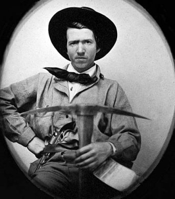 1849 - Prospector with gun and pick