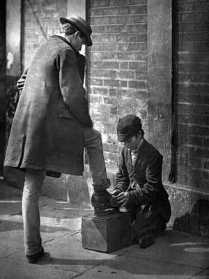 c. 1877 - Shoeshine boy