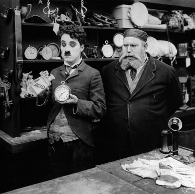 1916 - Charlie Chaplin and Henry Bergman in The Pawnshop
