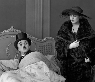 1921 - Charlie Chaplin and Edna Purviance in The Idle Class