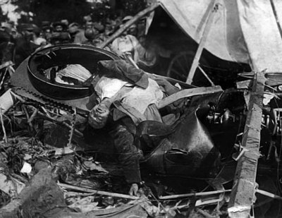 1918 - A German pilot lies dead in his crashed airplane