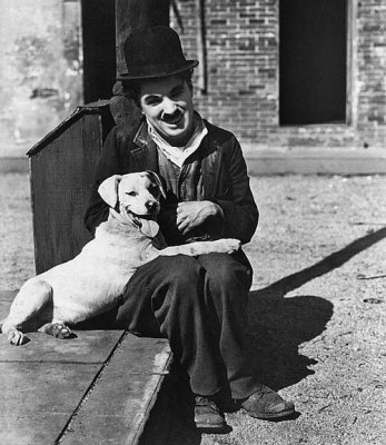 1918 - Still of Charlie Chaplin with Scraps (the dog)