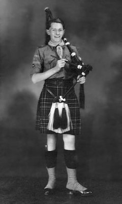 c. 1914 - Youth with bagpipes