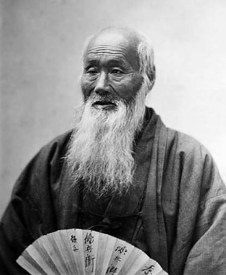 1880's - Old man with a fan