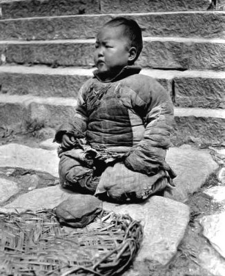 c. 1918 - Baby put on the street to beg