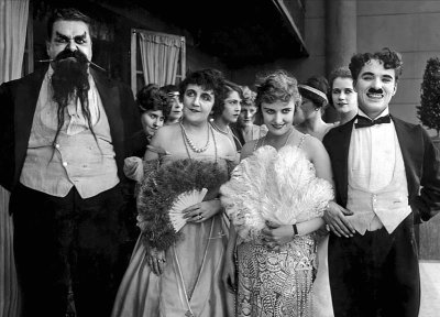 1917 - Eric Campbell, Marta Golden, Edna Purviance, and Charlie Chaplin