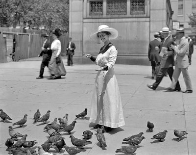 c. 1915 - Feeding the pigeons