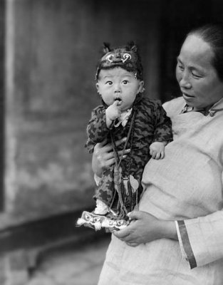 1919 - Baby boy in a tiger suit