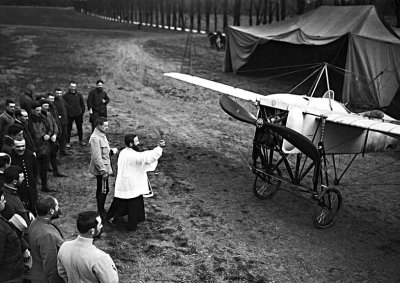 1915 - French priest blessing an airplane