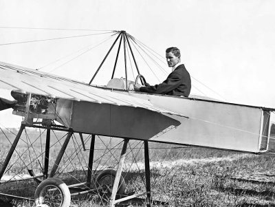 c. 1910 - J. M. Johnson in his flying machine