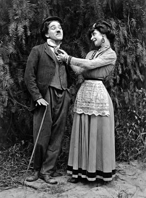 1914 - Charlie Chaplin and Minta Durfee in The Star Boarder