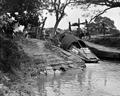 c. 1918 - Launching boat by mud slide