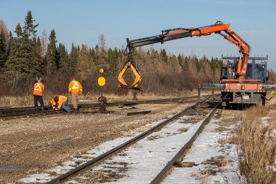 Track repairs near derailed locomotive in Moosonee.