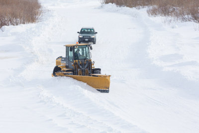 Plowing the winter road