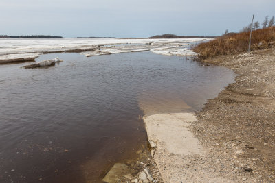 Water over public docks access road May 8th.