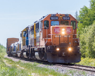 1806 and 2202 lead Polar Bear Express Sunday edition into Moosonee.