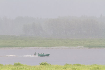 Taxi boat across the river in rain 2014 July 4th.