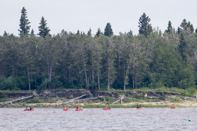 Canoes approaching Charles Island in the Moose River across from Moosonee.