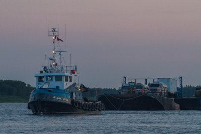 Tug Nelson River and barge head down the Moose River 2014 August 17th.