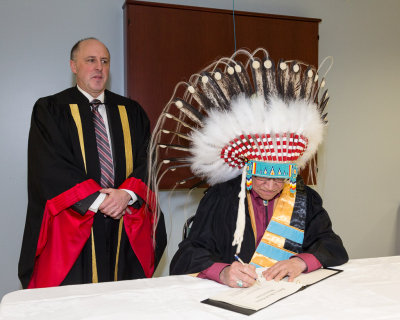 University of Sudbury President Pierre Zundel with Edmund Metatawabin