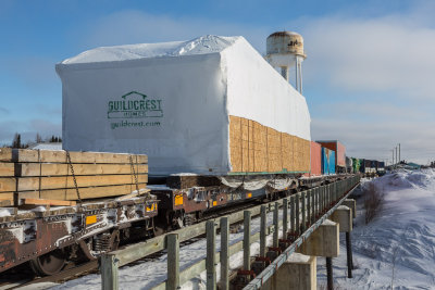 Modular home crossing Store Creek as part of freight 419