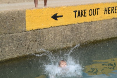 Adrian Jumping Into Water from Ponca Bridge