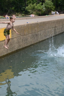 Adrian Jumping Into Water from Ponca Bridge