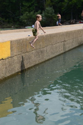 Adrian Jumping Into Water from Ponca Bridge