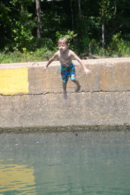 Adrian Jumping in At Ponca Access Bridge