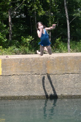 Helen Jumping in At Ponca Access Bridge