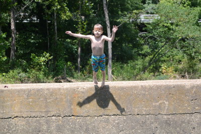 Adrian Jumping in At Ponca Access Bridge