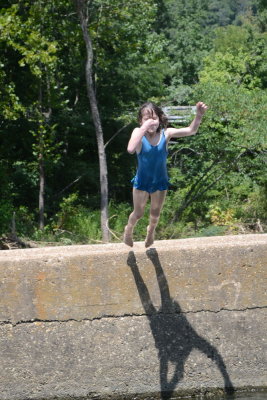 Helen Jumping in At Ponca Access Bridge
