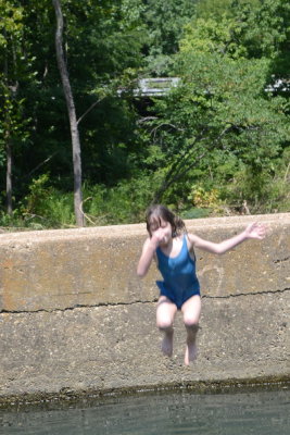 Helen Jumping in At Ponca Access Bridge