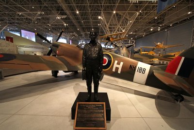 Statue of Buzz Beurling in front of a Spitfire Mk. IX, Canada Aviation and Space Museum, Ottawa, Ontario