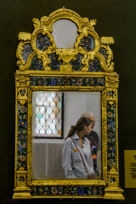 Reflection of a guest in the mirror.