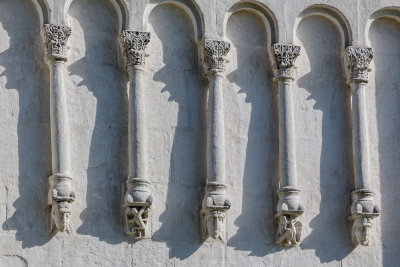 Gargoyles hang from below the windows.