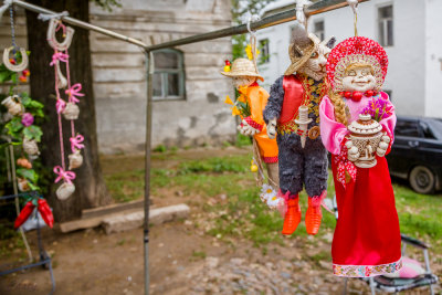 Some dolls waiting to be purchased.