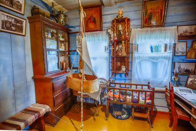 Living room (1).  Note how the cradle hangs from a branch.