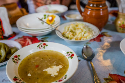 Delicious soup served with sour cream.