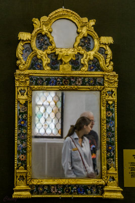 Reflection of a guest in the mirror.
