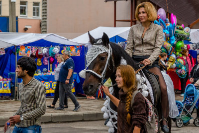 Another kid gets a pony ride