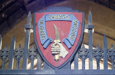 Coat of Arms of St. Bartholomew above Interior Iron Gate Entrance