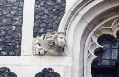 North Façade: Corbel: Left of Top Center Lancet Window