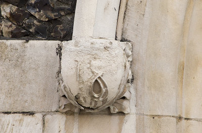 North Transept Façade: Corbel: Left of Transept Door