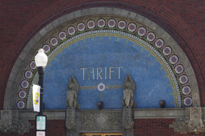 Mosaic half-round above front door with winged lions
