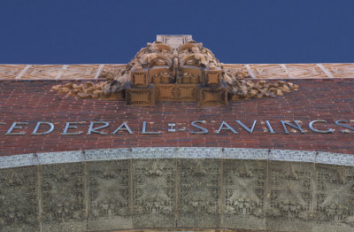 Tera cotta arch with ornament above