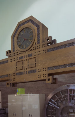 Ornamental wooden clock, from right