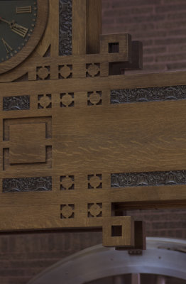 Ornamental wooden clock, bottom right ornament