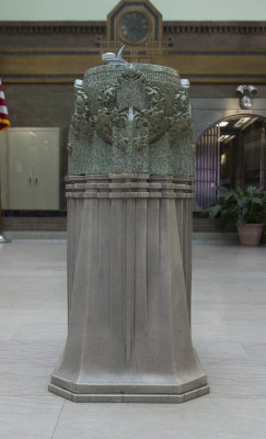 Drinking fountain in center of banking room